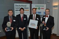Dr. Arbogast Grunau (right), Senior Vice President Product Development Industrial (CTO) and Member of the Management Board Industrial, and Reinhold Korn (left), project manager for the large-size bearing test rig, received the "selected landmark" award fo