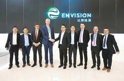 Envision CEO, Zhang Lei, and LM Wind Power CEO, Marc de Jong, shake hands to mark the announcement of the 71.8 meter blade to be developed for Envision, at China Windpower 2017 in Beijing. (Image: LM Wind Power)