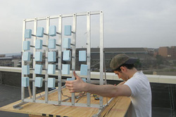 Close-up of the vibro-wind panel, with student Zach Gould